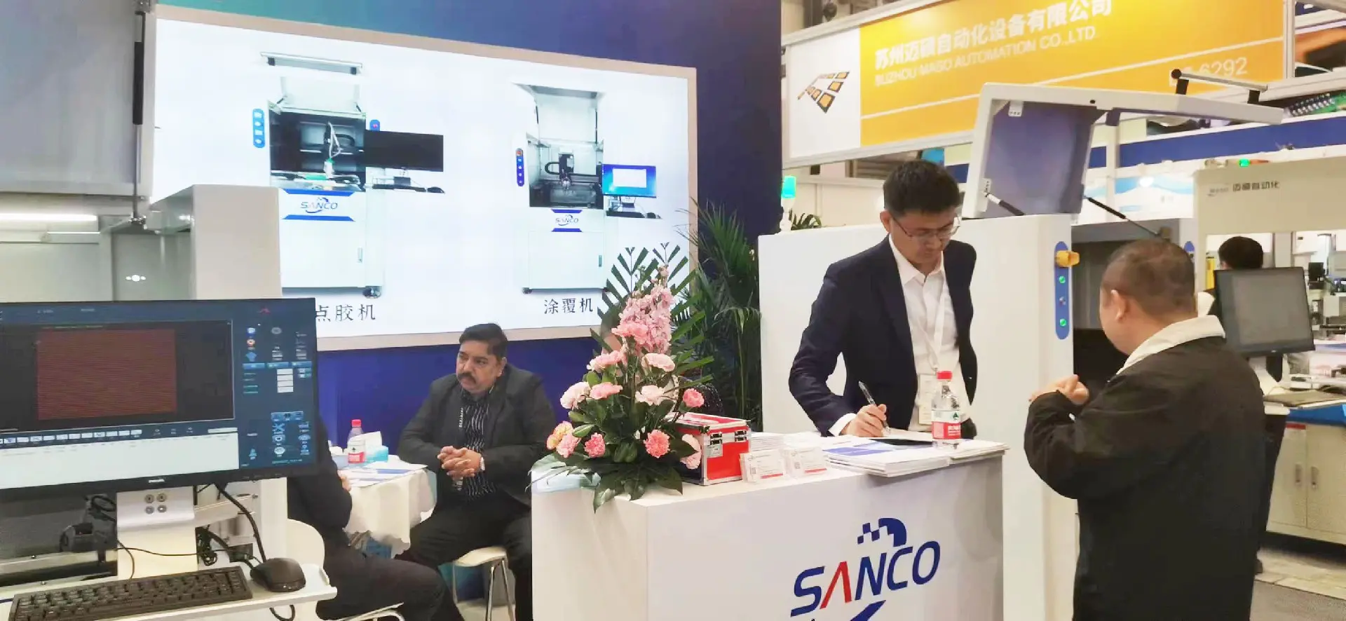 SANCO team with international customers at facility visit