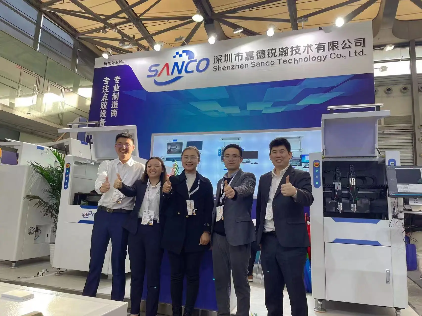 Customer group photo at SANCO technology showroom