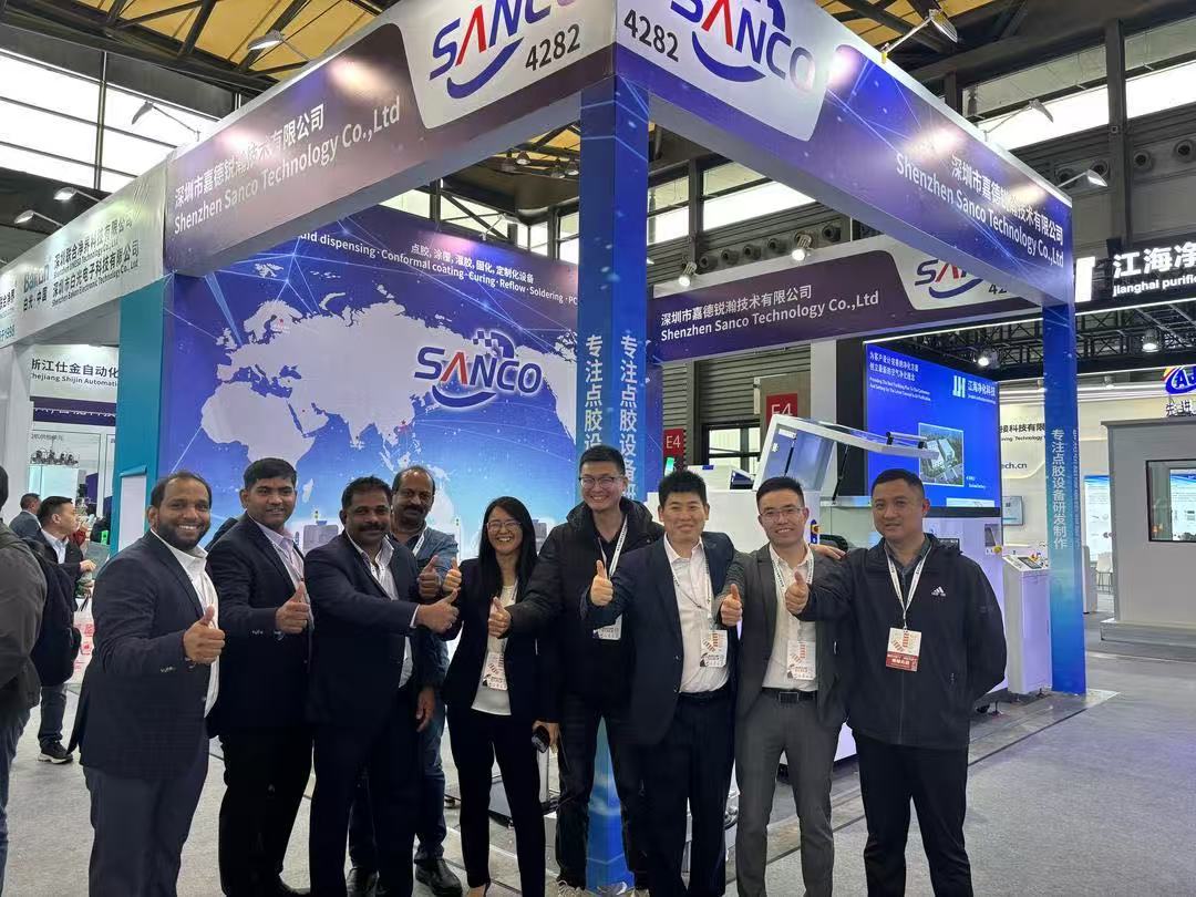 SANCO team group photo with customers at exhibition